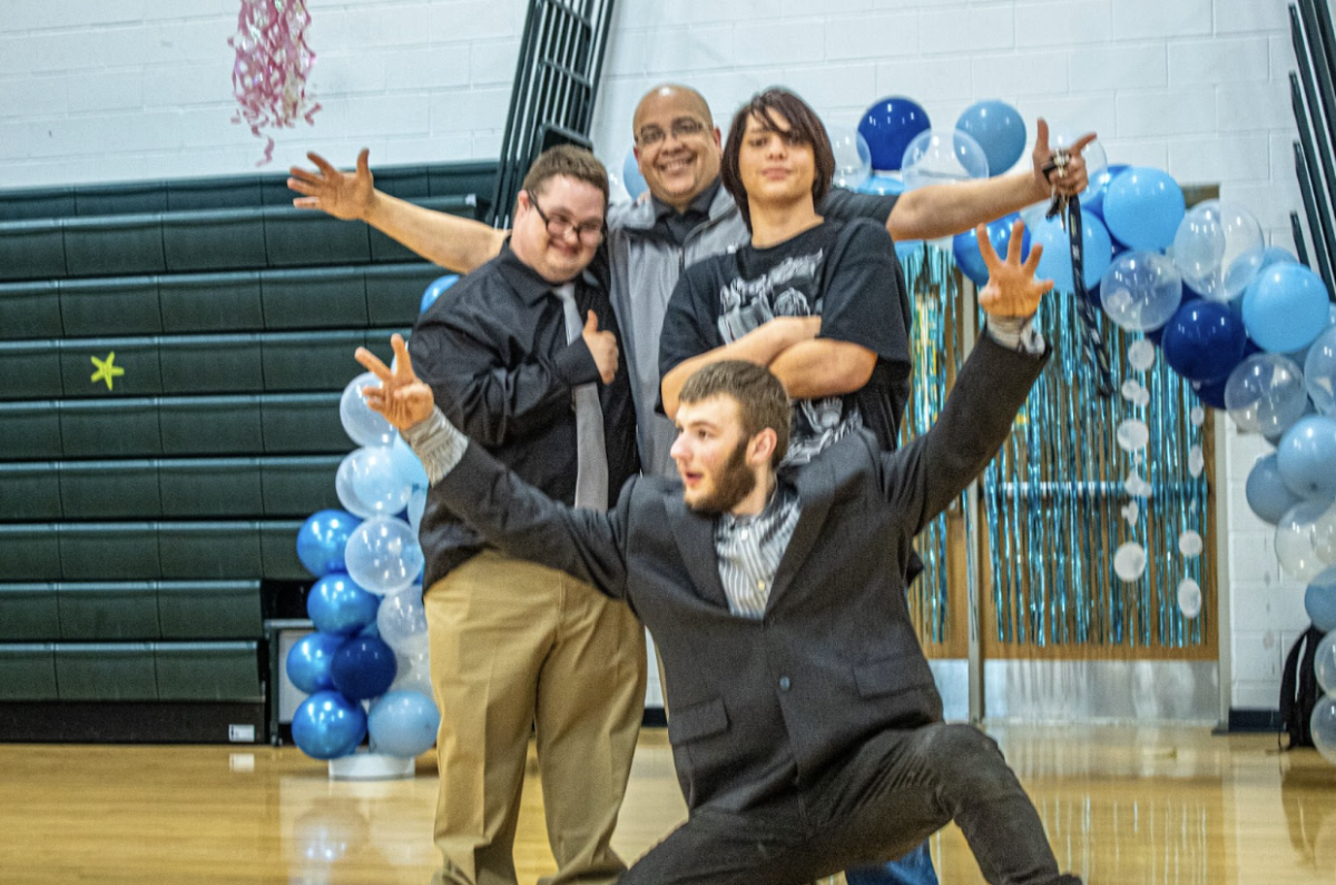Principal Redd and the students gather to dance and have fun.